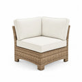 Rattanowy fotel narożny z kremowymi poduszkami 78x78x64 cm